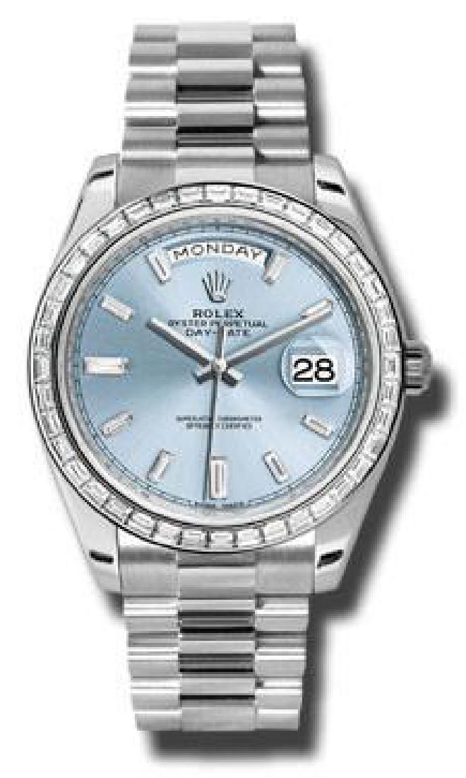 Rolex Model # 228396TBR Rolex Day Date Platinum 40MM: Rolex Model # 228396TBR Rolex Day Date Platinum 40MM With Baguette Bezel Bracelet : President Dial : Ice Blue Baguette Diamond #J242