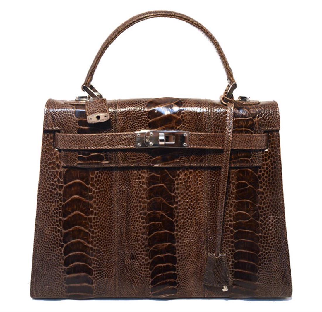 Lorenzi Brown Ostrich Kelly Bag: GORGEOUS LORENZI ostrich leather kelly bag in excellent condition. Â Brown ostrich leather exterior trimmed with shining silver hardware and lock with clochette and key. Â Black leather lined inte
