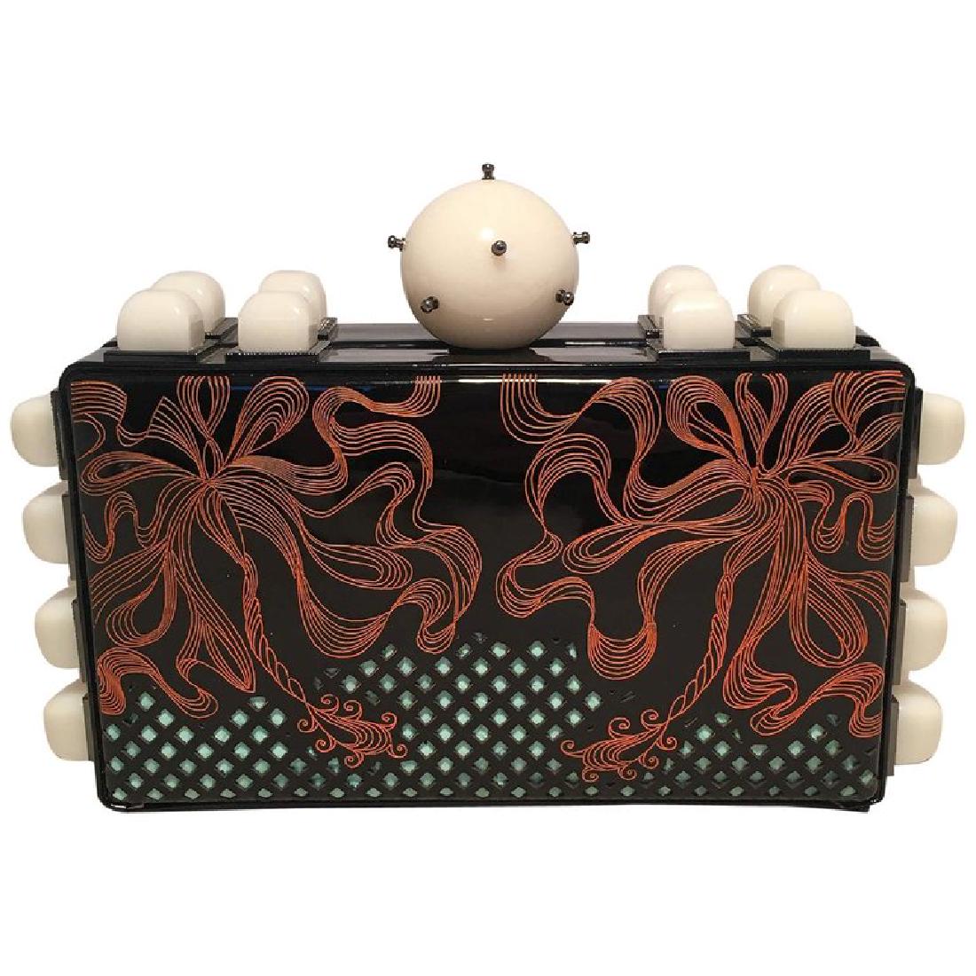 Tonya Hawkes Black Patent Leather Laser Cut and Etched: FABULOUS Tonya Hawkes Black Patent Leather Laser Cut and Etched Orange and Teal Clutch in excellent condition. Black patent leather exterior trimmed with cream acrylic studs and top ball closure. Blac