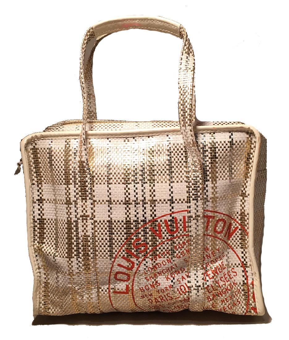 Louis Vuitton White and Gold Braided Street Shopper PM: Louis Vuitton White and Gold Braided Street Shopper PM Tote in good condition. White and gold woven leather plaid jute print exterior trimmed with white patent leather. Discontinued limited edition st