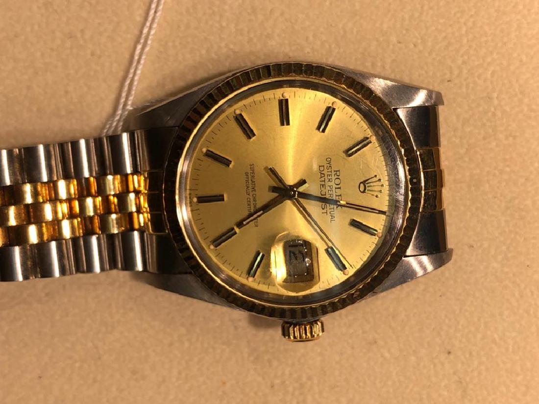 ROLEX DATEJUST 16013 MEN'S PREOWNED WATCH: Model Name/Number: Datejust 16013 Gender: Men's Movement / Features: Automatic 3035 movement w/ date, acrylic crystal, waterproof screw-down crown Case: Stainless steel w/ 18k yellow gold fluted bezel