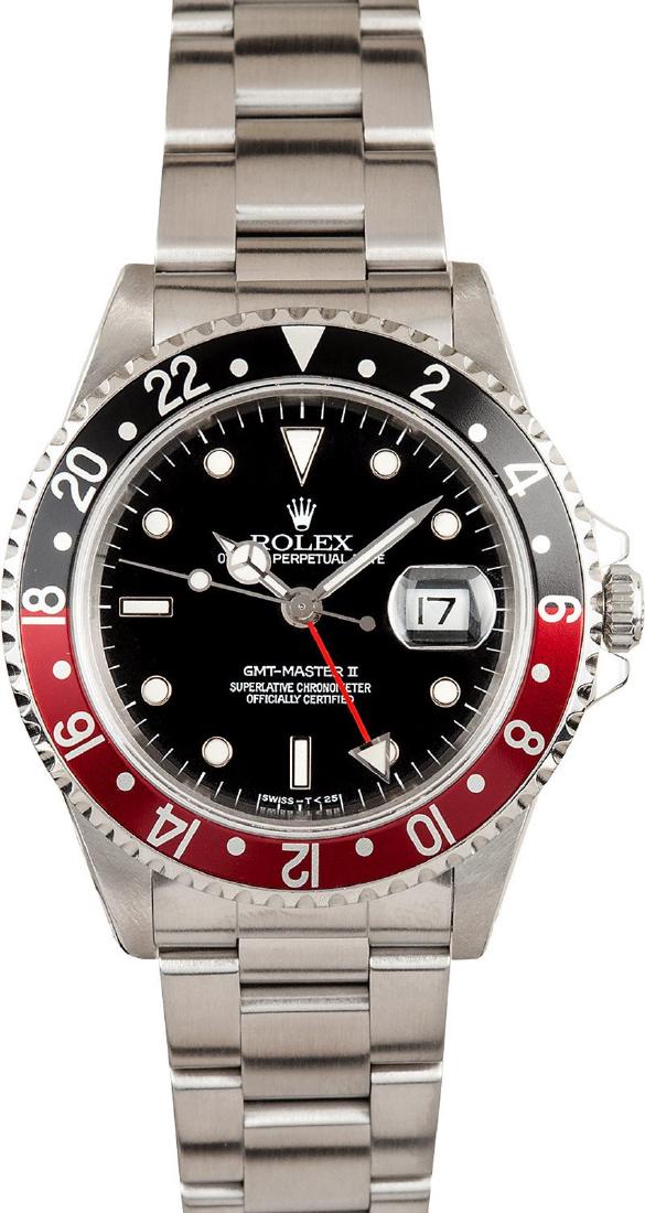 Pre-owned GMT-Master: Model/Style-GMT-Master II - 16710 Features-Automatic movement, Quickset, scratch-resistant sapphire crystal, waterproof screw-down crown Case-Stainless steel w/ red and black "Coke" bezel insert (40