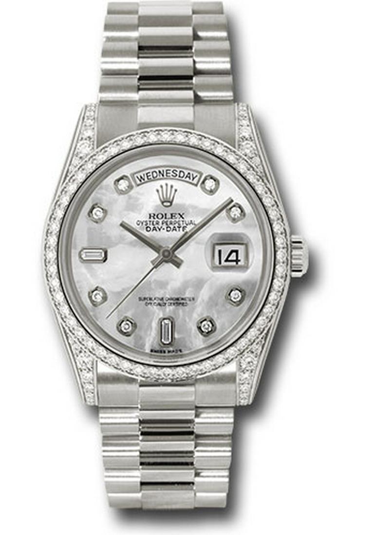 Rolex Model # 118389 Rolex Day Date WG with Diamond: Rolex Model # 118389 Rolex Day Date WG with Diamond Bezel and Lugs Bracelet : President Dial : Dark MOP Diamond #J182