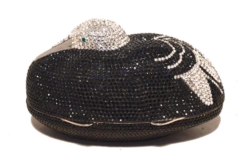 Judith Leiber Black & Silver Crystal Sitting Duck: GORGEOUS JUDITH LEIBER swarovski crystal sitting duck minaudiere in excellent vintage condition. Black and silver swarovski crystal exterior trimmed with silver hardware. Lifting style closure opens t