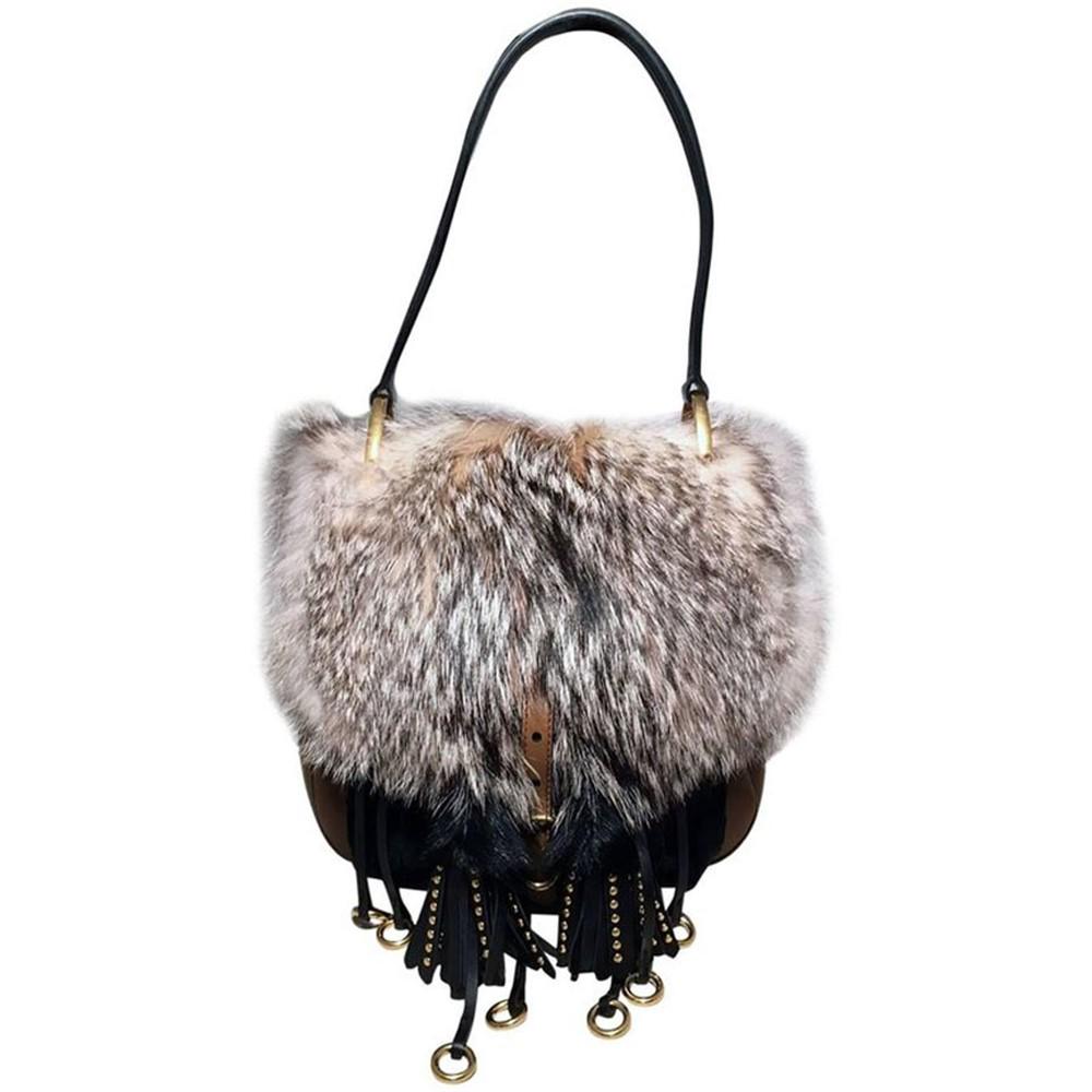 NWOT Prada Fox Fur and Tan Leather Shoulder Bag: AMAZING NWOT Prada Fox Fur and Tan Leather Shoulder Bag in excellent condition. Natural grey fox fur top and back exterior trimmed with black leather top handle, tan leather body and brass hardware. U