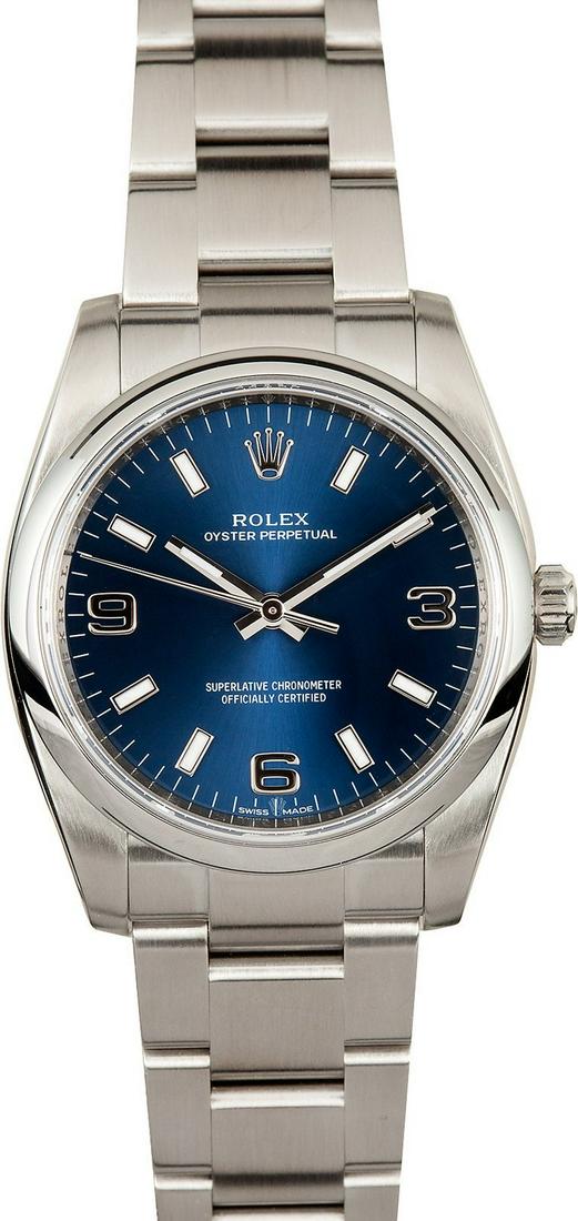 Pre-owned Rolex Air-King: Model/Style-Air King 114200 Features-Automatic 3130 movement, scratch-resistant sapphire crystal, waterproof screw-down crown Case-Stainless steel w/ smooth bezel (34mm), inner reflector ring engrav