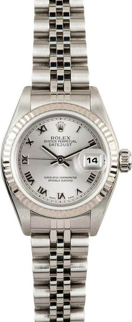 Pre-owned Rolex Date Just: Model/Style-Datejust 79174 Features-Automatic movement w/date, scratch-resistant sapphire crystal, waterproof screw-down crown Case-Stainless steel w/ 18k white gold fluted bezel (26mm) Bracelet-Stain
