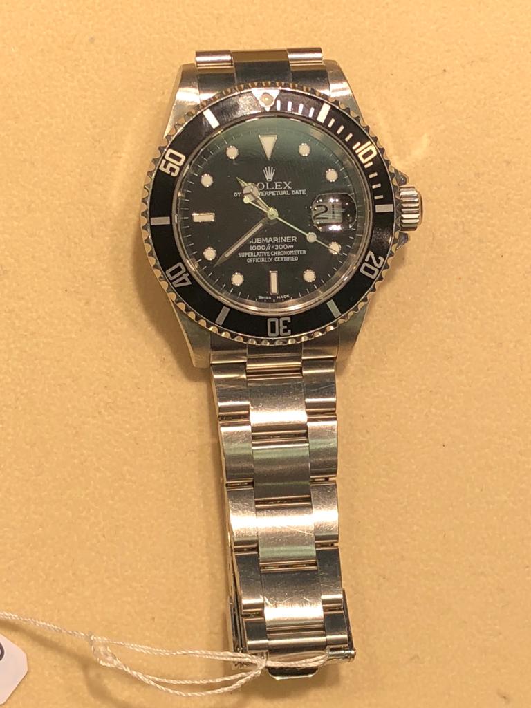 ROLEX SUBMARINER 16610: Model: Submariner 16610 Gender: Men's Movement / Features: Automatic 3135 movement w/ date, waterproof screw-down crown, unidirectional rotatable time-lapse diver's bezel, scratch-resistant sapphire c