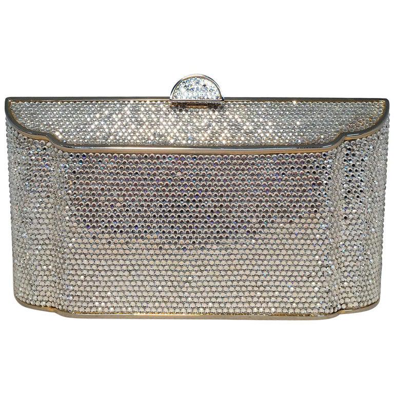 Judith Leiber Clear Swarovski Crystal Angled Box: Judith Leiber Clear Swarovski Crystal Angled Box Minaudiere Evening Bag Clutch in excellent condition. Clear swarovski crystal covered exterior with gold hardware trim. Top lifting closure opens to a