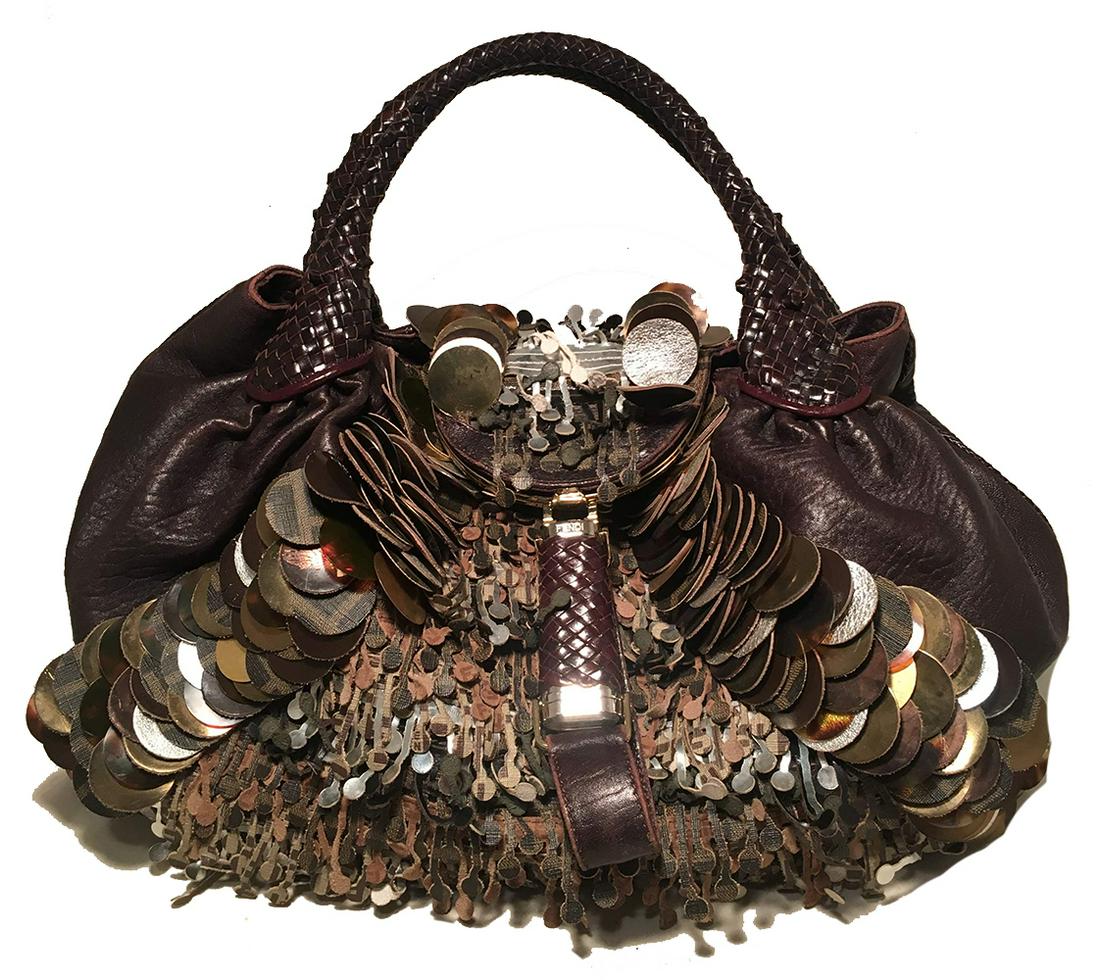 Fendi Borsa Spy Bag in Brown Leather fringe and Zucca: Fendi Borsa Spy Bag in Brown Leather fringe and Zucca Canvas in very good condition. Signature spy bag style with brown leather sides, woven leather handles, zucca print canvas bottom, unique laser cu