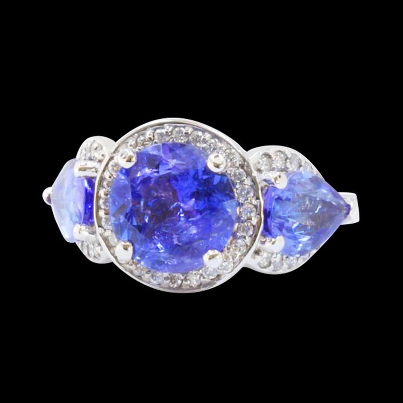 5.6CT NATURAL TANZANITE 14K W/G RING: 14K W/G NATURAL TANZANITE RING :6.30GM/DIA :0.70CT/TANZANITE:5.6CT/#GVR1396