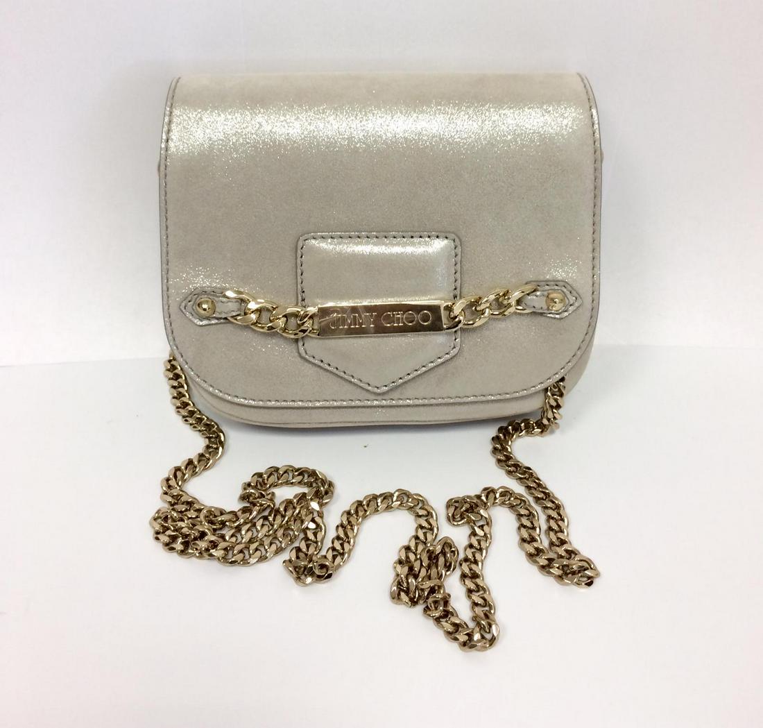 Jimmy Choo Metallic Silver Leather "CIGGY" Wristlet: Jimmy Choo Metallic Silver Leather "CIGGY" Wristlet Clutch Bag Condition : New