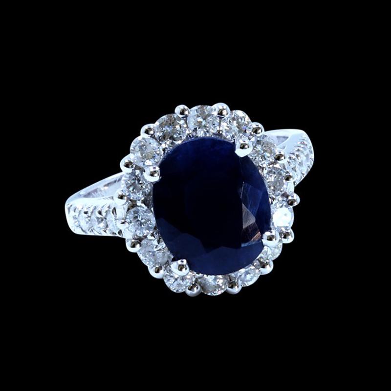 4.57CT NATURAL CEYLON BLUE SAPPHIRE 14K WHITE GOLD RING: 14K WHITE GOLD NATURAL CEYLON BLUE SAPPHIRE RING :6.79GRAM/BLUE SAPPHIRE OVAL: 4.57CT/ DIAMOND RD: 1.12CT/#GVR1256 **Night sky deep azure of the 4.57ct oval shape Natural Burma Sapphire, which is know