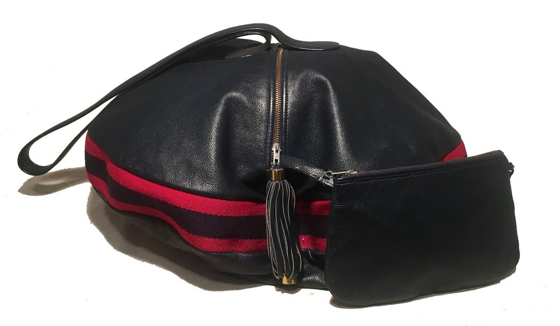 Rare Gucci Vintage Navy Leather Striped Canvas Shoulder: RARE Gucci Vintage Navy Leather Striped Canvas Shoulder Bag in very good condition. Navy blue leather exterior in unique flying saucer shape trimmed with signature red and navy canvas stripes around m