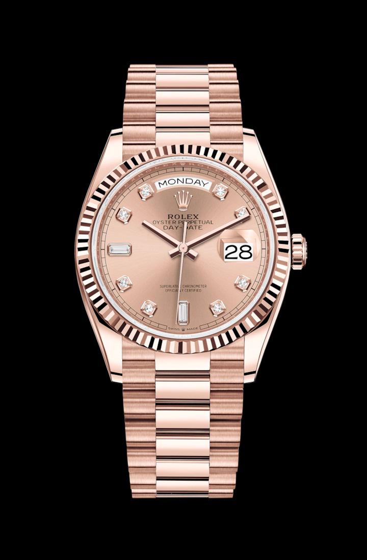 Rolex New 36MM Day Date RG Model #128235: Rolex New 36MM Day Date RG Model #128235 Bracelet : President Dial : Pink Diamond #J669
