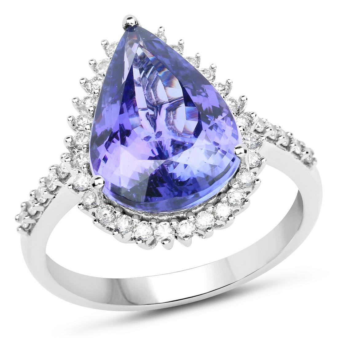 5.44ct Tanzanite 14K White Gold Ring: Metal : 14K White Gold Metal Wt : 3.22gm Tanzanite Wt : 5.44ct Diamond Wt : 0.38ct Size #7 Item #QR20952TANWD-14KW-7