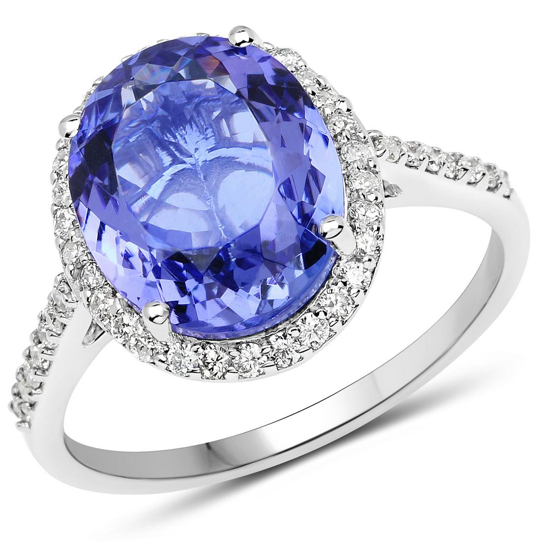 4.46ct Tanzanite 14K White Gold Ring: Metal : 14K White Gold Metal Wt : 2.7gm Tanzanite Wt : 4.46ct Diamond Wt : 0.3608ct Size #7 Item #QR21513TANWD-14KW-7