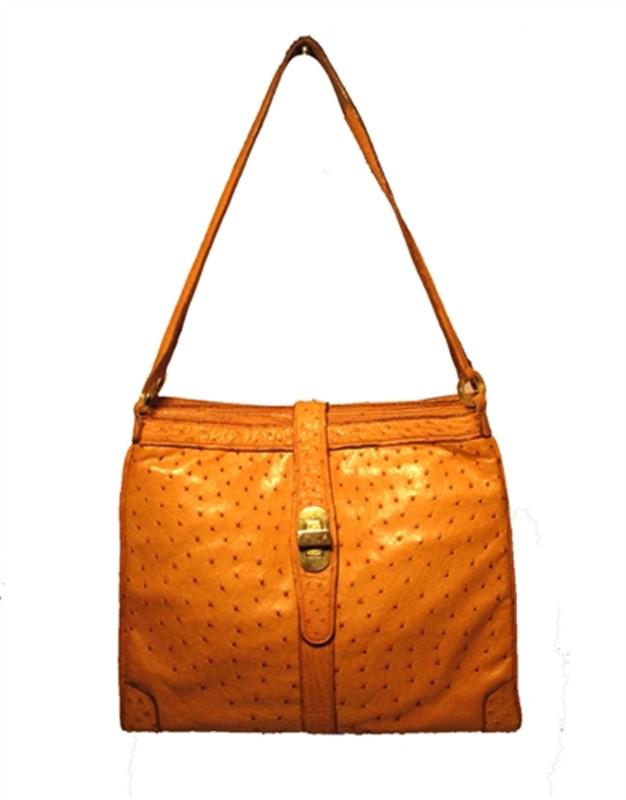 Vintage Mark Cross Tan Ostrich Shoulder Bag: This rare Mark Cross shoulder bag is in excellent vintage condition. The exterior features stunning tan ostrich leather trimmed with gold hardware. Three separate storage compartments provide ample sp