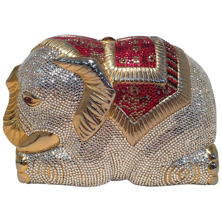 RARE Judith Leiber Swarovski Crystal Elephant: RARE Judith Leiber Swarovski Crystal Elephant Minaudiere Evening Bag Clutch in excellent condition. Adorable gold metal body in the shape of a sitting elephant covered completely with clear crystals,