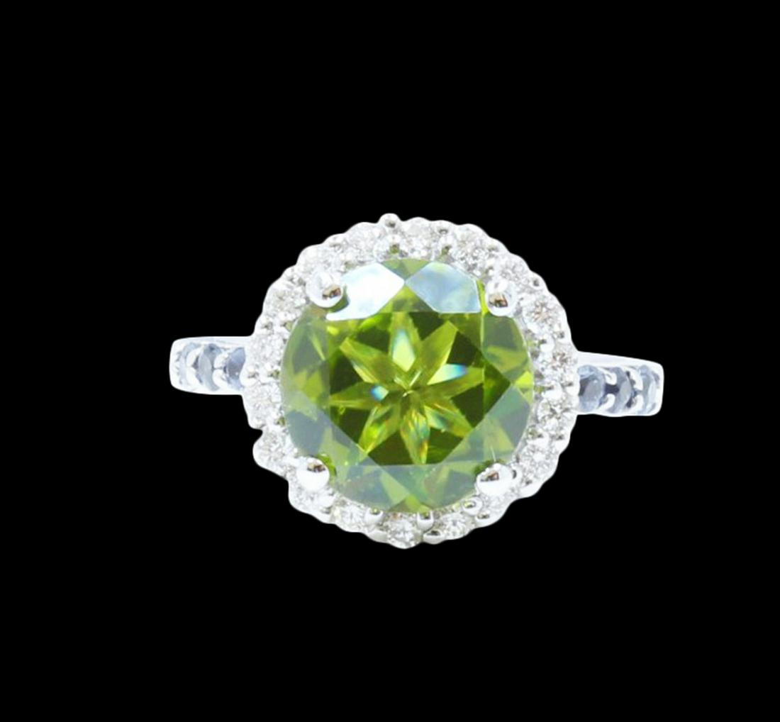 4.01CT NATURAL BURMA PERIDOT 14K W/G RING: 14K W/G NATURAL BURMA PERIDOT RING :4.28GR/DIA :0.35CT/NATURAL CEYLON BLUE SAPP: 0.26CT/BURMA PERIDOT :4.01CT/#GVR1401