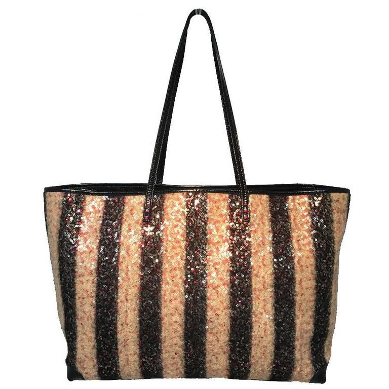 Fendi Striped Wool Sequin Limited Edition Shopper Tote: Gorgeous Fendi striped sequin wool shopper tote in excellent condition. Black and tan striped wool exterior woven with delicate sequins throughout to add a touch of glamour. Black patent leather trim 