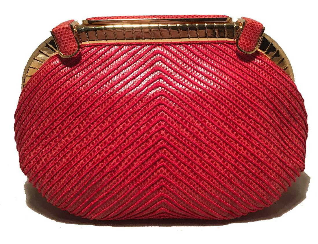 Judith Leiber Vintage Red Lizard Embroidered Clutch: Judith Leiber Vintage Red Lizard Embroidered Clutch in excellent condition. Red lizard leather exterior with matching red emboidered V pattern throughout trimmed with gold hardware at top edge. Top do