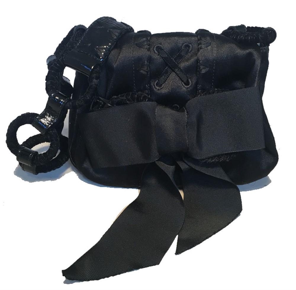 Yves Saint Laurent YSL Black Silk Satin Ribbon Bow: ADORABLE YSL black silk ribbon evening bag in excellent condition. Black silk exterior trimmed with a black lace up design along the top front flap, circled velvet covered shoulder strap and a black b