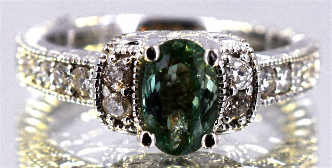 Alexandrite 1.58 ctw Diamond Ring 14KW: 14kt White Gold 5.55 Approx grams including, 1.30ct Oval Alexandrite .28ctw Round Diamond G-H color VS-SI clarity