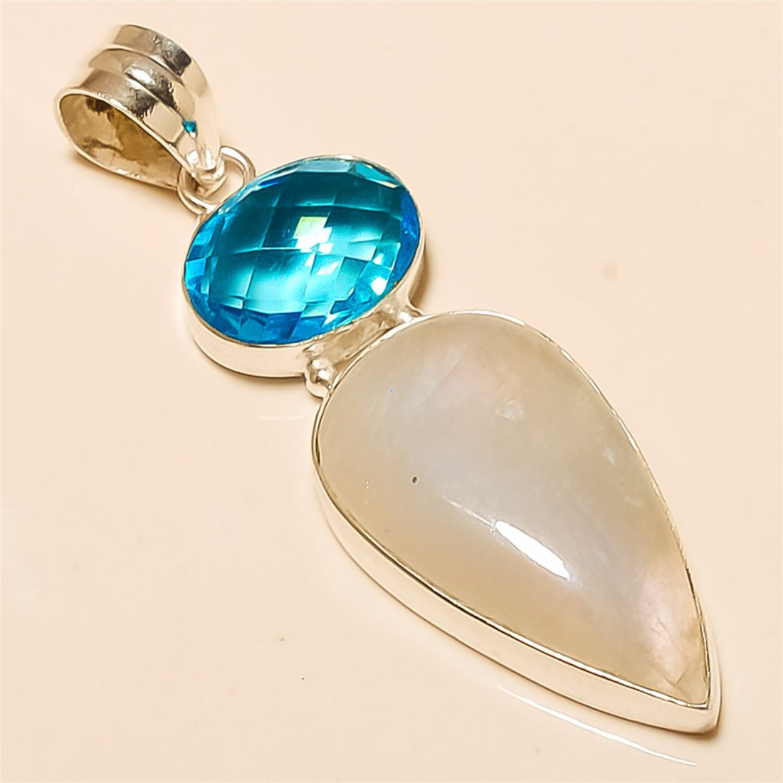 Moonstone/Blue Topaz Pendant Solid Sterling Silver: Moonstone/Blue Topaz Pendant Solid Sterling Silver Length:2.5 inch Weight:12 gram #P-518