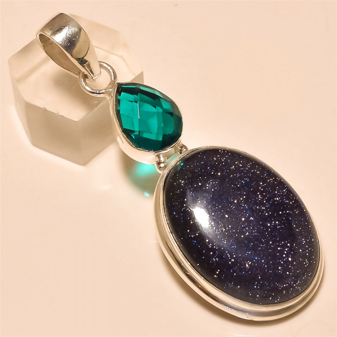 Sunstone/London Blue Topaz Pendant Solid Sterling: Sunstone/London Blue Topaz Pendant Solid Sterling Silver Length:2.5 inch Weight:14 gram #P-594