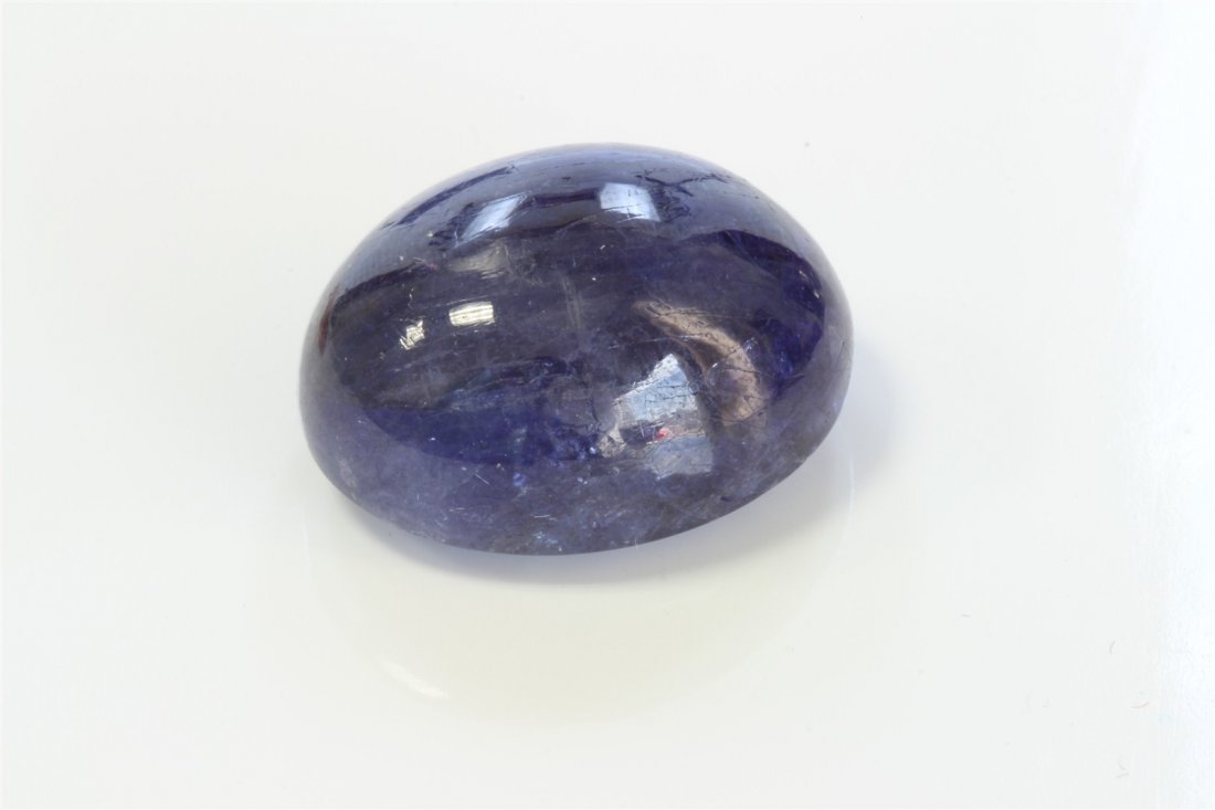 NATURAL TANZANITE CABOCHON OVAL SHAPE 50.54CT AND UP / (1 of 2)