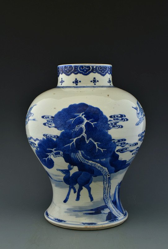 Chinese Blue and White Jar: China, 19th C., blue and white jar, with a high rounded shoulder, tapering to the flared base, and detailed landscape motifs, double ring mark on base. Height 33 cm.