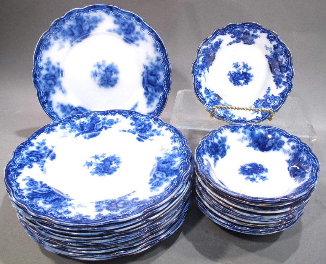 21 PIECES OF ROYAL STAFFORDSHIRE ANTIQUE FLOW BLUE: 21 PIECES OF ROYAL STAFFORDSHIRE ANTIQUE FLOW BLUE PLATES AND FRUIT BOWLS. In Arcadia pattern. 11 lunch plates 9"d. and 10 fruit bowls 5 1/2"d.