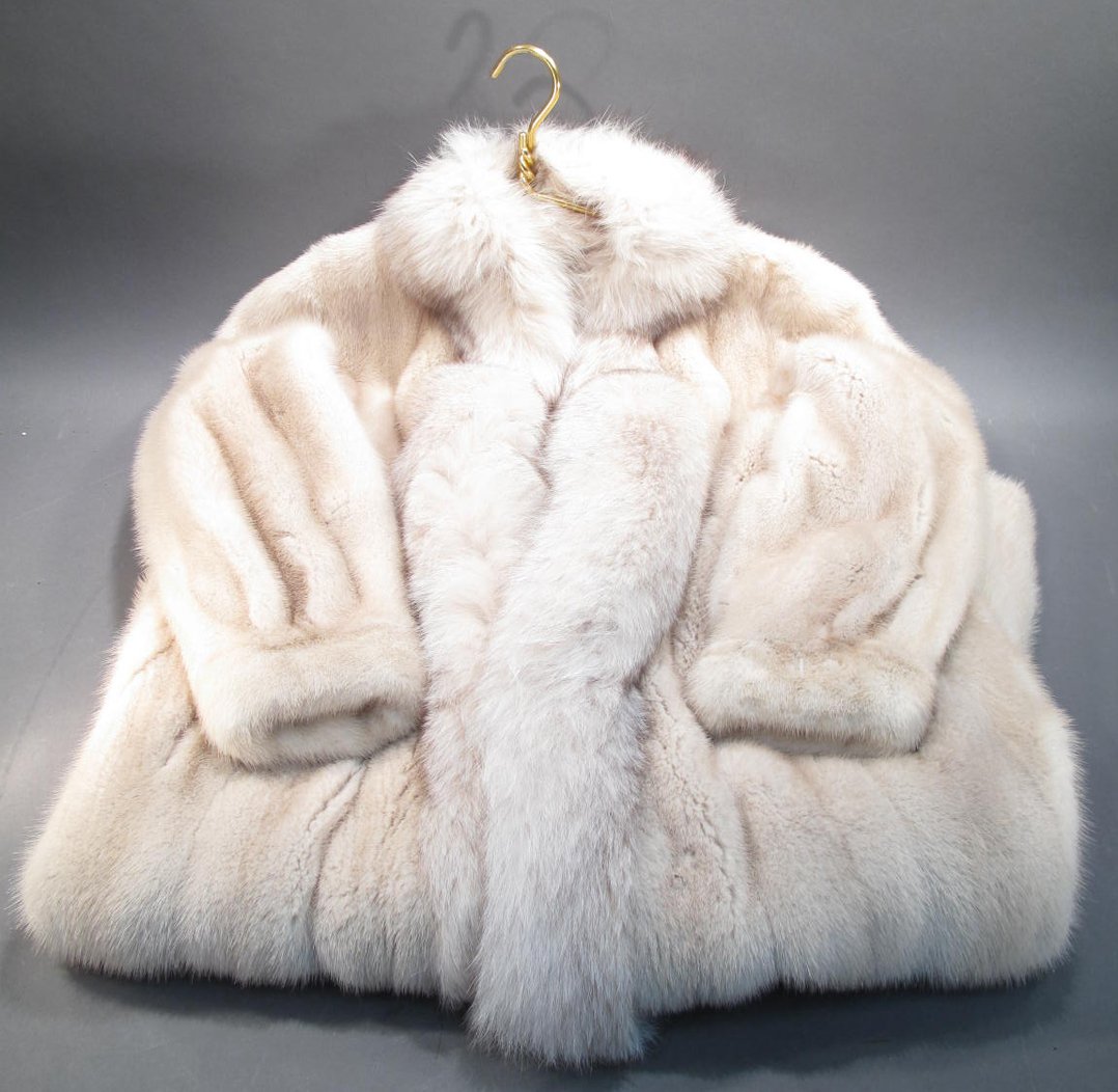 LIGHT TAN 3/4 LENGTH MINK COAT. Sleeves altered: LIGHT TAN 3/4 LENGTH MINK COAT. Sleeves altered (shortened). Approx. size 4. (Note: excellent condition).