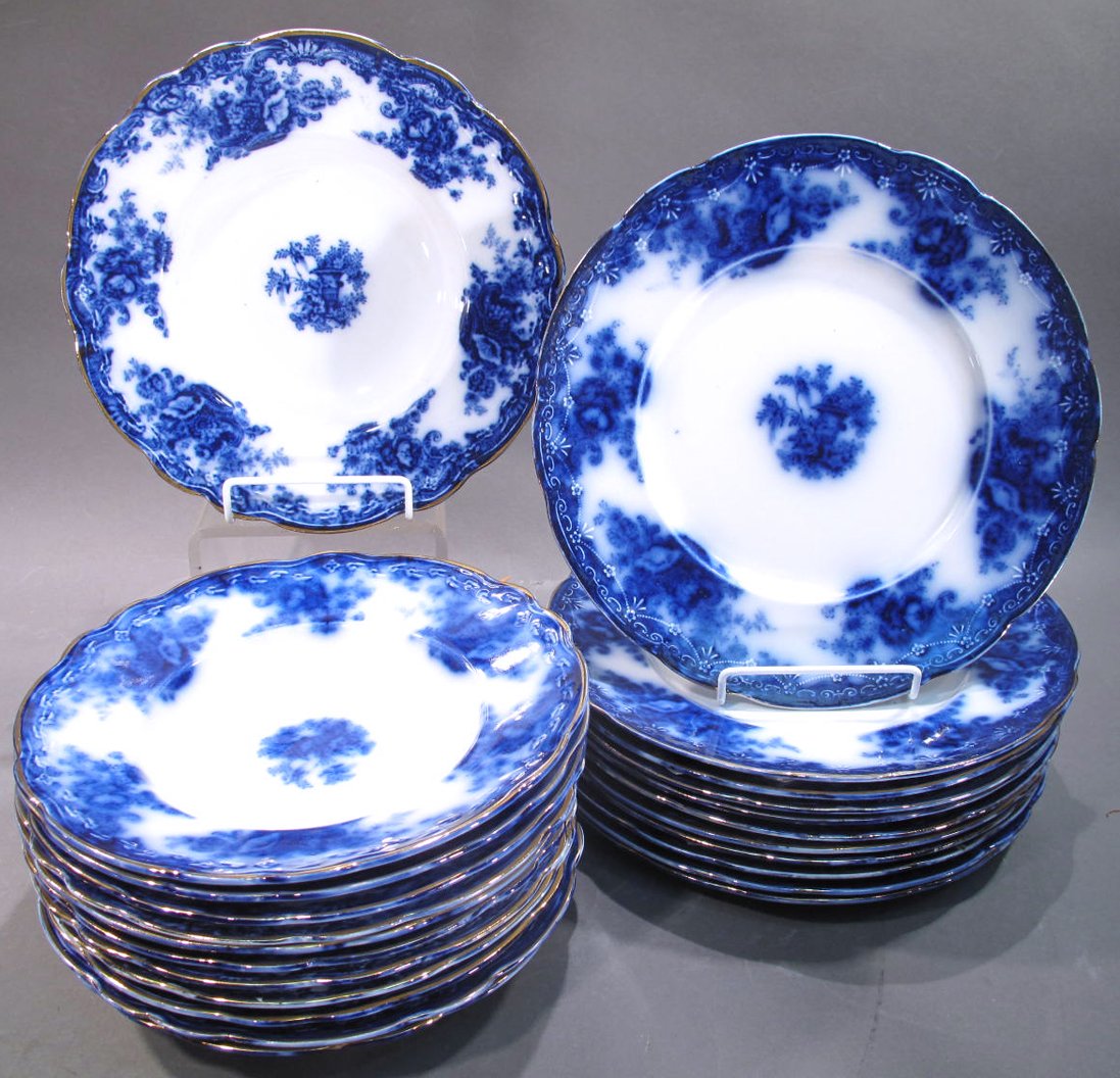 ELEVEN FLOW BLUE DINNER PLATES. Royal Staffordshire: ELEVEN FLOW BLUE DINNER PLATES. Royal Staffordshire "Arcadia" and 10"d. Together with 12 flow blue "Arcadia" bowls 9"d. (Note: some minor chips on rims).