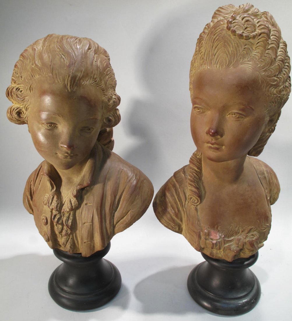 LARGE TERRA COTTA STATUE OF MARIE ANTOINETTE. On metal: LARGE TERRA COTTA STATUE OF MARIE ANTOINETTE. On metal base, 20". Together with an 18" terra cotta statue of a young boy. (Note: some damage to both).