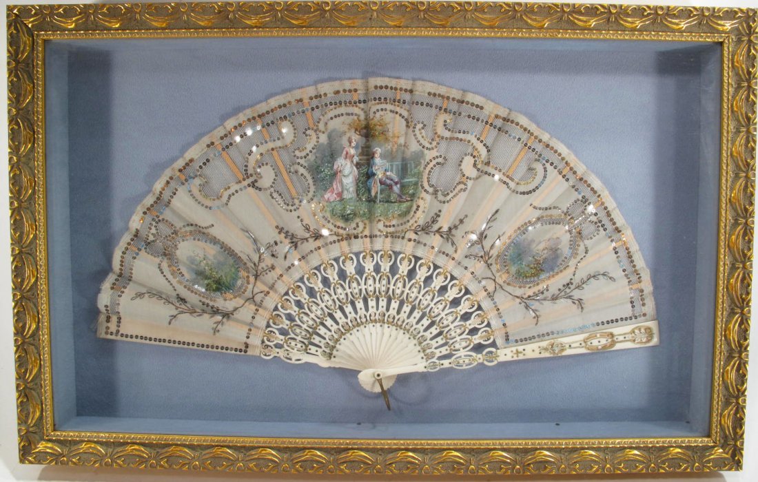 18TH CENTURY DESIGN OF A CASED FAN. Ivory ribs with: 18TH CENTURY DESIGN OF A CASED FAN. Ivory ribs with paneled painted silk scenesDepicting garden scenes of a man & woman. Sequin banner around panels.