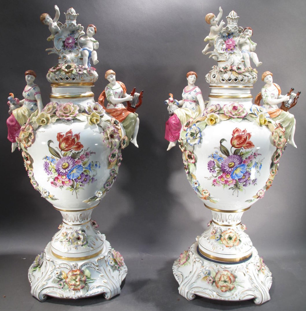 TWO NICELY DECORATED ITALIAN CONTEMPORARY PALACE URNS.: TWO NICELY DECORATED ITALIAN CONTEMPORARY PALACE URNS. With applied figures andflowers.
