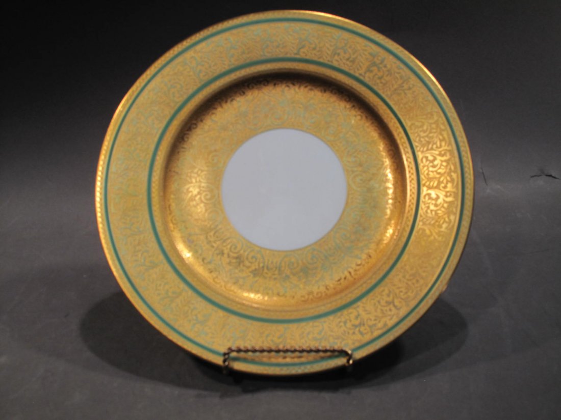 SET OF 12 HUTSCHENREUTER SELB BAVARIAN SERVICE PLATES.: SET OF 12 HUTSCHENREUTER SELB BAVARIAN SERVICE PLATES. Gold embossed borders,with green rims.