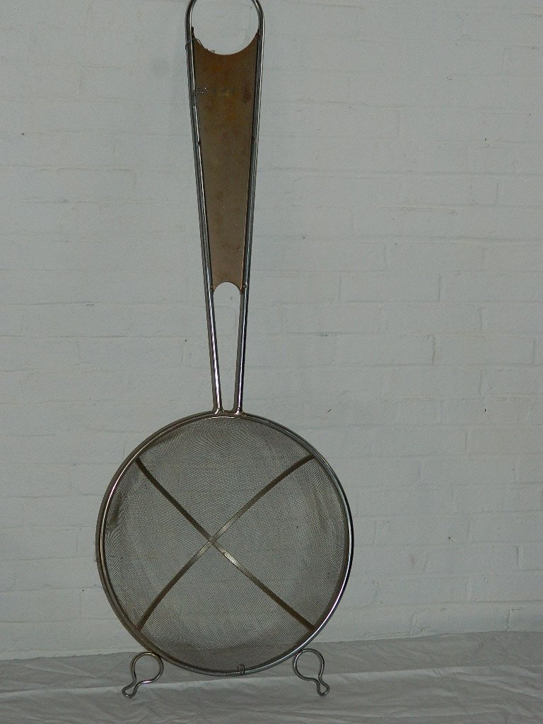 Mid Century Curtis Jere Metal Kitchen Art Strainer: Signed Curtis Jere mid century kitchen wall art.Great restaurant piece or gift for the cooking enthusiast.This piece is a strainer that measures 54.5" in height.It has an approximate diameter of 19.5"