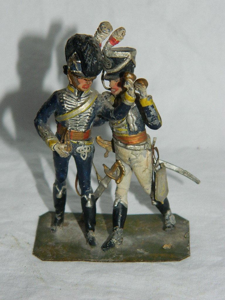 Stadden Revolutionary War Pewter Toy Soldier: Double mount soldiers appear to be raising cups in celebration. One appears to be a higher authority than the other based on the uniforms. Measures approximately 2 5/8" in height. Marked on base with 