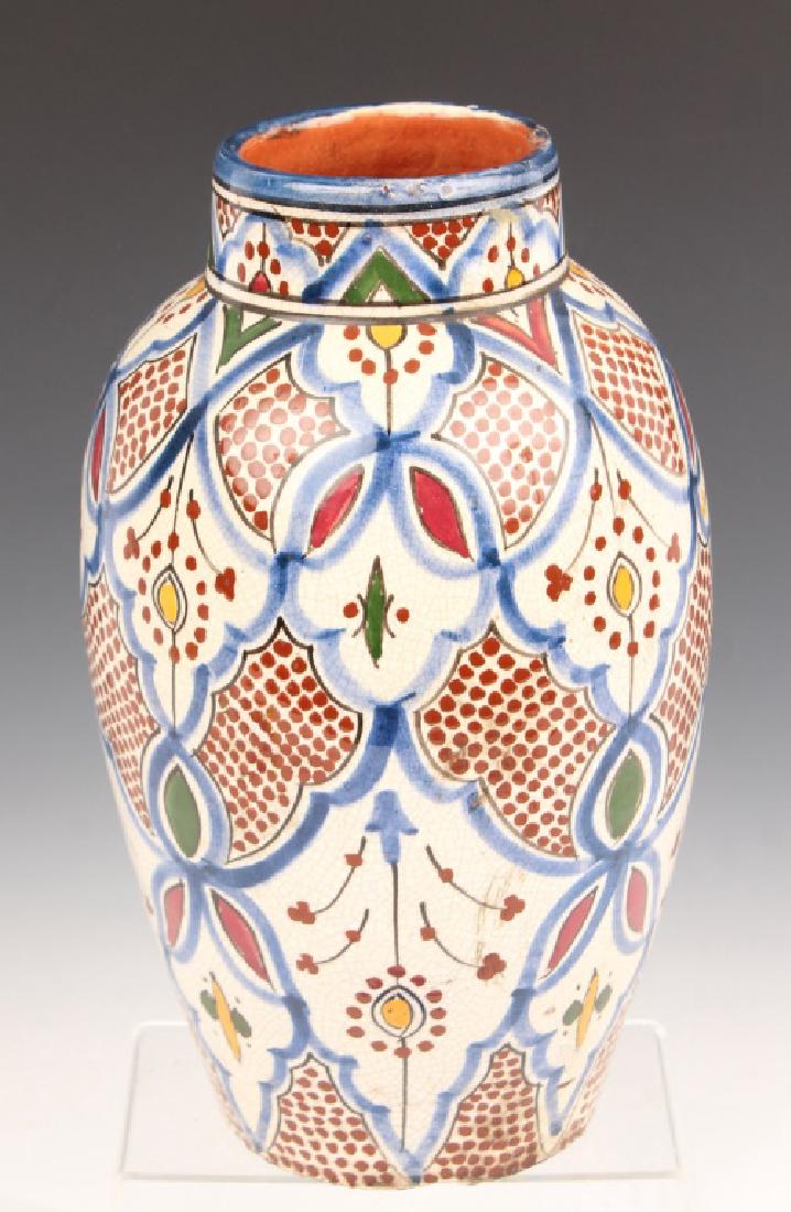 TUNISIAN CERAMIC VASE: TUNISIAN CERAMIC VASE Tunisian ceramic vase with polychrome decoration. Size: 12.75" Shipping / Pickup: Buyer Pick Up, 3rd Party Tunisian ceramic vase with polychrome decoration. Size: 12.75" Shipping