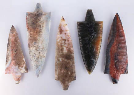 5 AGATIZED CORAL FLORIDA ARROWHEADS: 5 AGATIZED CORAL FLORIDA ARROWHEADS Lot of 5 agatized coral Florida arrowheads. Size: 4.25" to 5.25" Shipping / Pickup: We Can Ship This Item Lot of 5 agatized coral Florida arrowheads. Size: