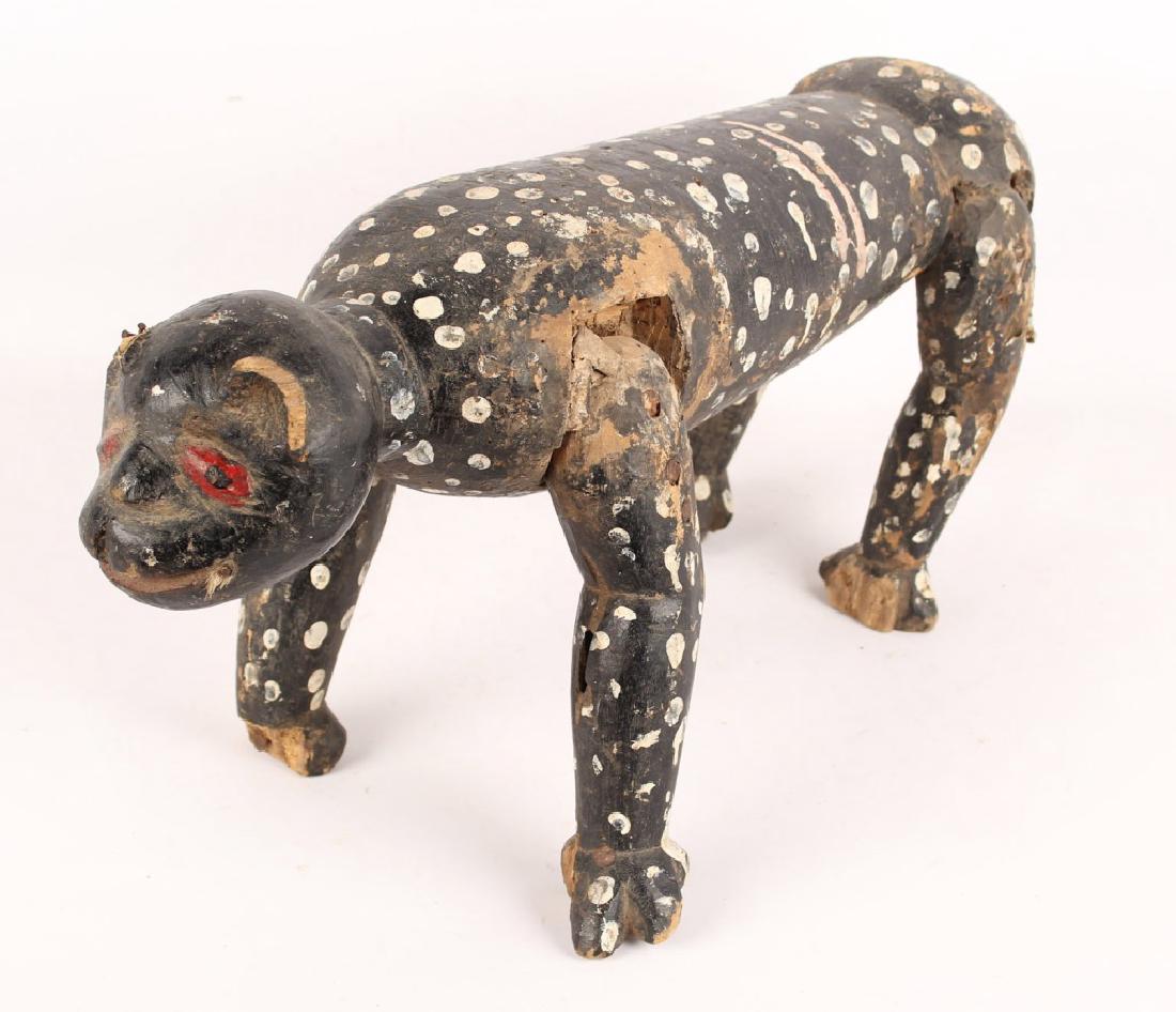 AFRICAN IGALA TRIBE LEOPARD WOOD SCULPTURE: AFRICAN IGALA TRIBE LEOPARD WOOD SCULPTURE African Igala wooden sculpture of leopard. Size: 11.5 x 23" Shipping / Pickup: Buyer Pick Up, 3rd Party