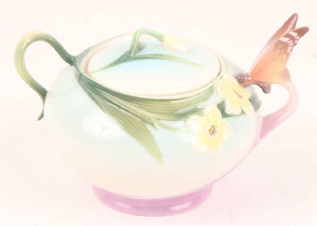FRANZ BUTTERFLY SUGAR JAR: FRANZ BUTTERFLY SUGAR JAR Hand crafted contemporary porcelain, with delicate artistic collaboration of Art Nouveau style and traditional Chinese character. Subtle earth tones of blue, green and pink b