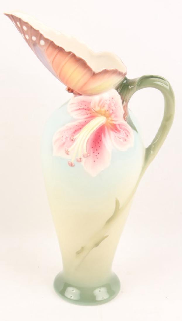 FRANZ WATER PITCHER: FRANZ WATER PITCHER Hand crafted contemporary porcelain, with delicate artistic collaboration of Art Nouveau style and traditional Chinese character. Subtle tones of blue, green and pink are blended t
