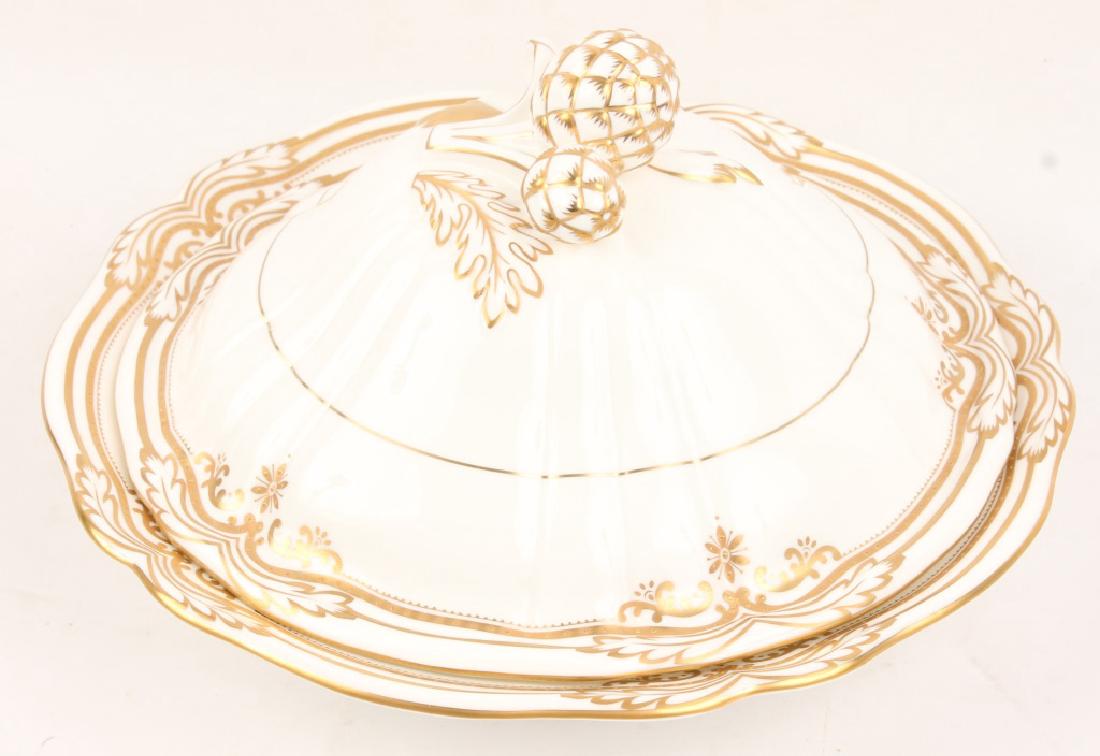 SPODE COVERED VEGTABLE DISH: SPODE COVERED VEGTABLE DISH England's Finely crafted, hand painted Bone China, Stafford White pattern Y8554-a10. Richly gilded in gold with Artichoke patterned lid embellishments. Size: 11" Shipping /