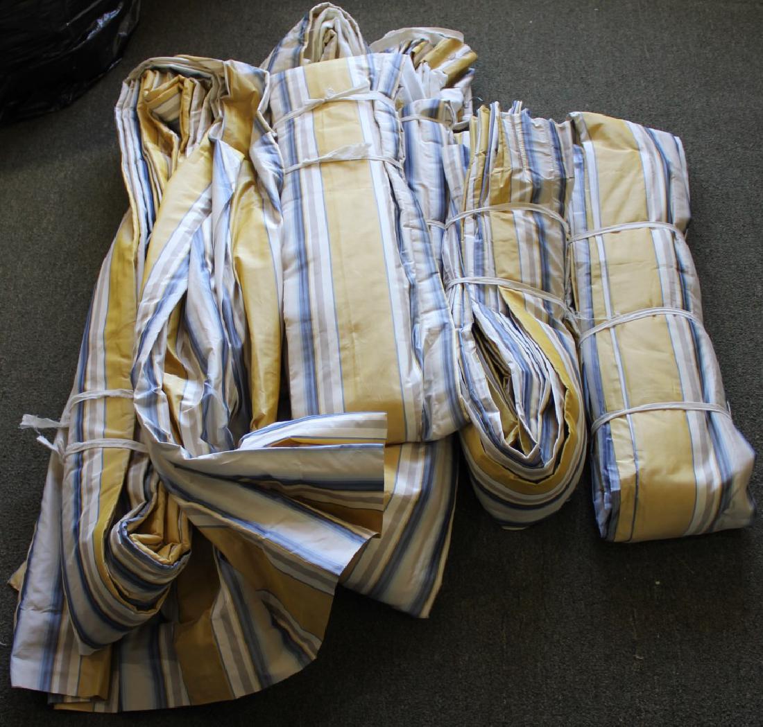 SIX SETS OF CURTAINS: SIX SETS OF CURTAINS Blue and yellow pinstripe. Size: 28x112 each Shipping / Pickup: We Can Ship This Item