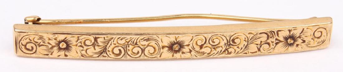 LADIES 14K YELLOW GOLD ENGRAVED BROOCH: LADIES 14K YELLOW GOLD ENGRAVED BROOCH Ladies 14K yellow gold brooch / pin with engraved acanthus design to front. Weight: 3.3 grams Size: 51 mm Shipping / Pickup: We Can Ship This Item