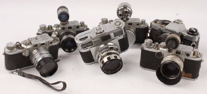 6 20TH CENTURY FILM CAMERAS: 6 20TH CENTURY FILM CAMERAS Six 20th century film cameras. Includes: Olympus, Leica, and Braun. Shipping / Pickup: Buyer Pick Up, 3rd Party